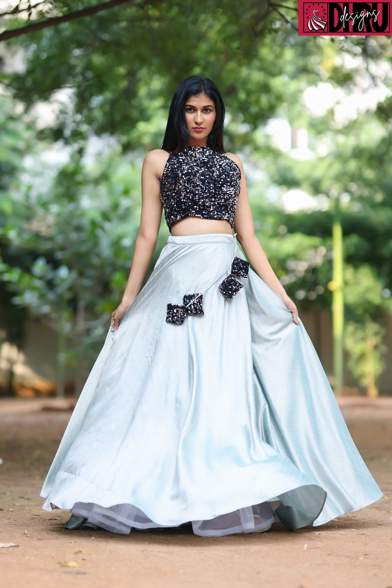 Black sequins halter neck blouse with dola silk umbrella cut flared lehenga. - Dhru Boutique and Fabrics