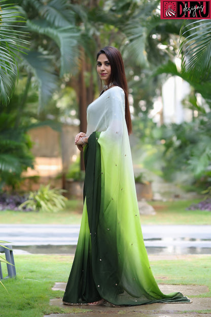 Chinnon fabric saree featuring an ombré pattern of light to dark green - Dhru Boutique and Fabrics